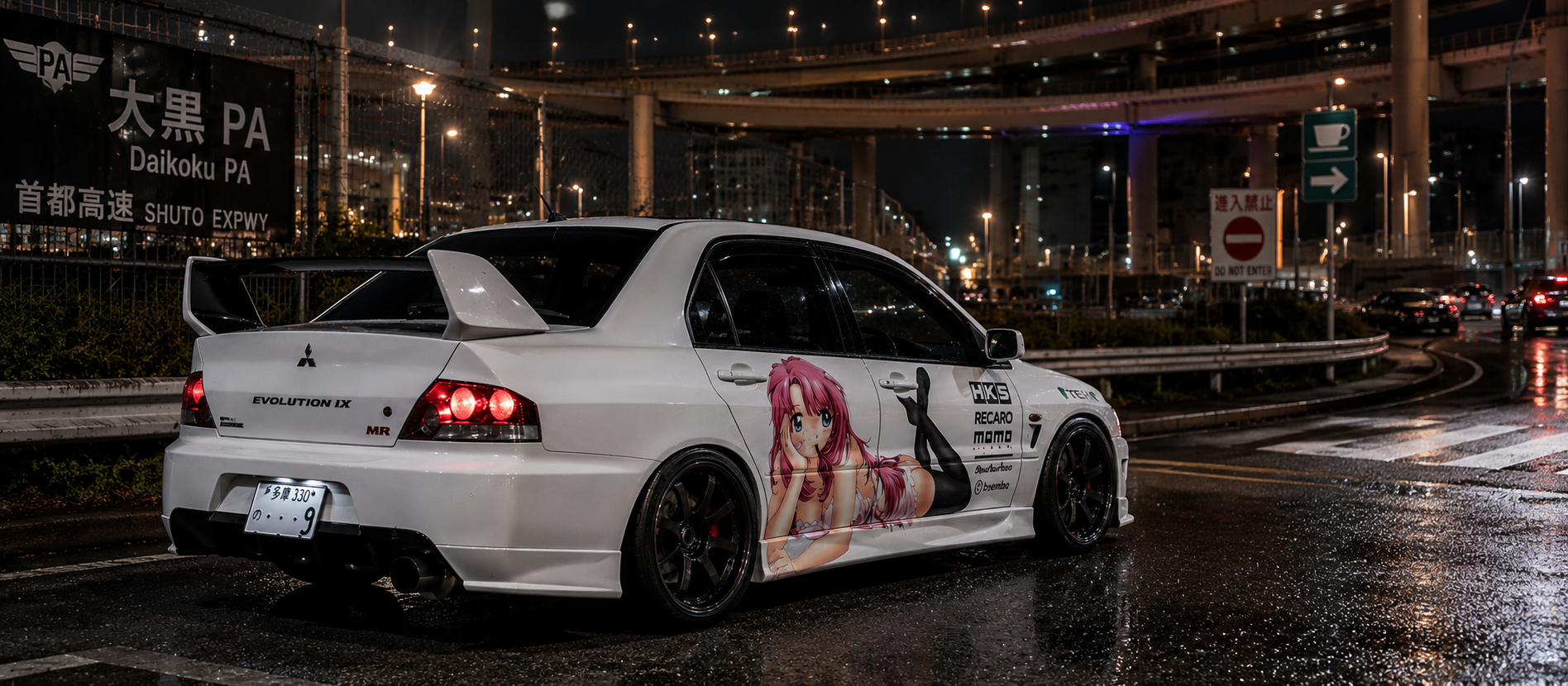 Rear three-quarter view of Mitsuki's modified white Mitsubishi Evo IX beneath the expressways at Daikoku Parking Area at night